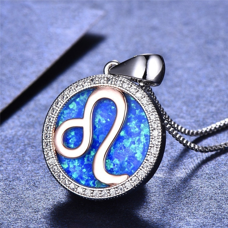 Necklace with a blue opal pendant featuring a silver 'S' design on a blue background